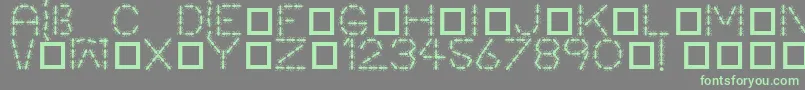 フォントAntpile – 灰色の背景に緑のフォント