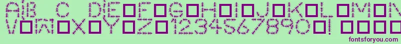 フォントAntpile – 緑の背景に紫のフォント