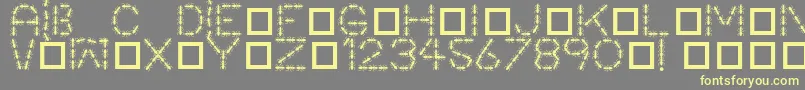 Antpile-Schriftart – Gelbe Schriften auf grauem Hintergrund