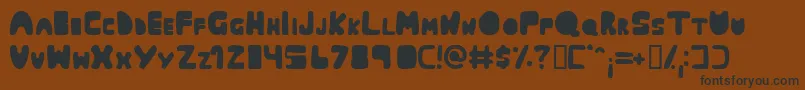 Muringa Font – Black Fonts on Brown Background