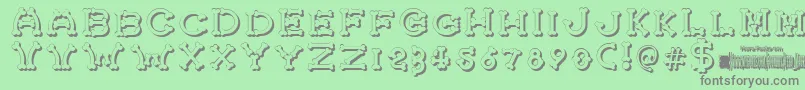 BonecrackerShadow Font – Gray Fonts on Green Background