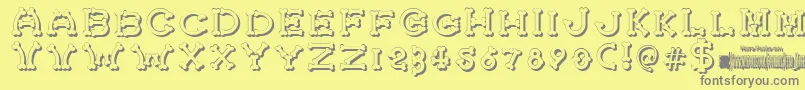 BonecrackerShadow Font – Gray Fonts on Yellow Background