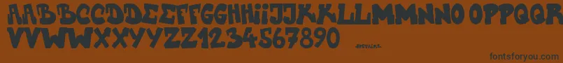 Upstairscvjmgraff Font – Black Fonts on Brown Background