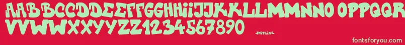 Upstairscvjmgraff Font – Green Fonts on Red Background