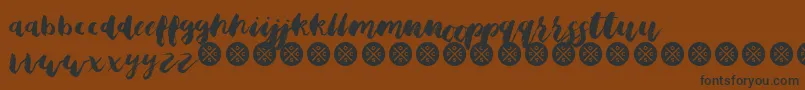 OsfcBristleBrushScriptRegularDemo Font – Black Fonts on Brown Background