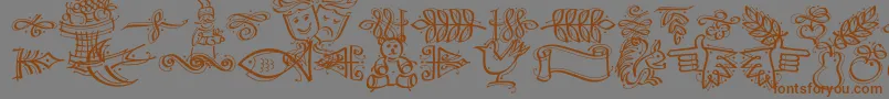 フォントDfCalligraphicOrnamentsLetPlain.1.0 – 茶色の文字が灰色の背景にあります。