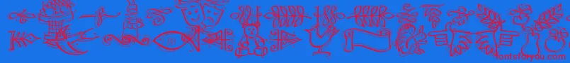 DfCalligraphicOrnamentsLetPlain.1.0 Font – Red Fonts on Blue Background