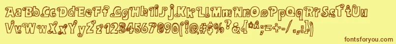 Alphasnail Font – Brown Fonts on Yellow Background