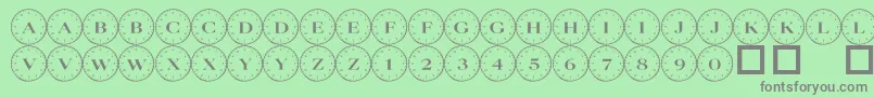 Fonte 101 Compass – fontes cinzas em um fundo verde