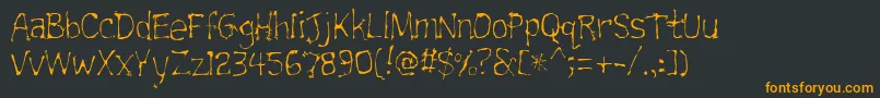 Trainwrecklite Font – Orange Fonts on Black Background