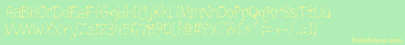 Trainwrecklite Font – Yellow Fonts on Green Background