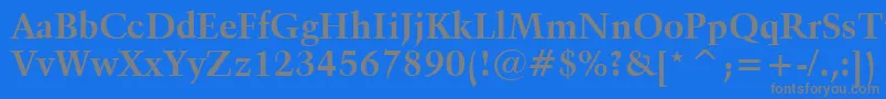 Kuenstler480BoldBt-Schriftart – Graue Schriften auf blauem Hintergrund