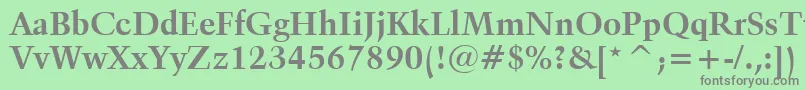 フォントKuenstler480BoldBt – 緑の背景に灰色の文字