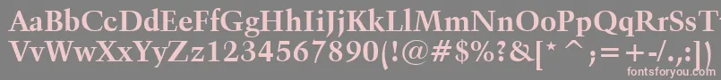 フォントKuenstler480BoldBt – 灰色の背景にピンクのフォント