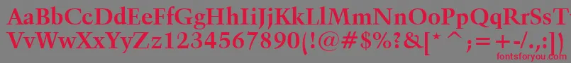 フォントKuenstler480BoldBt – 赤い文字の灰色の背景