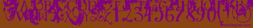 EgDragonCaps Font – Purple Fonts on Brown Background