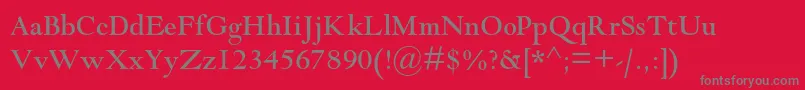 Goudymodernmtstd-Schriftart – Graue Schriften auf rotem Hintergrund