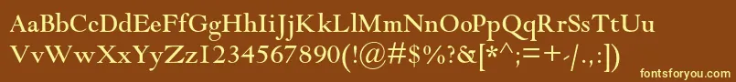 Goudymodernmtstd-fontti – keltaiset fontit ruskealla taustalla