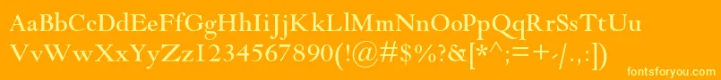 Goudymodernmtstd-fontti – keltaiset fontit oranssilla taustalla