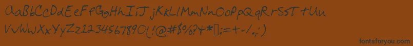 Colesfont Font – Black Fonts on Brown Background