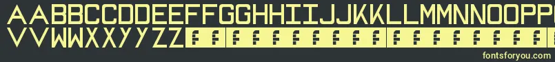 Mike Font – Yellow Fonts on Black Background