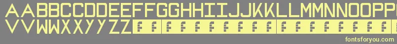Mike Font – Yellow Fonts on Gray Background