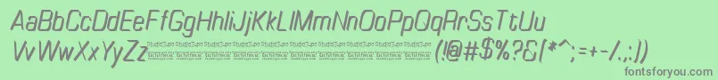 TinyplateItalicDemo Font – Gray Fonts on Green Background