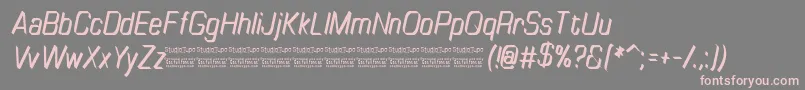TinyplateItalicDemo-Schriftart – Rosa Schriften auf grauem Hintergrund