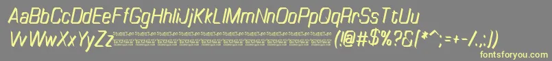 TinyplateItalicDemo Font – Yellow Fonts on Gray Background