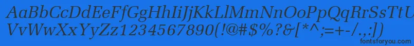 Czcionka ProtocolSsiItalic – czarne czcionki na niebieskim tle