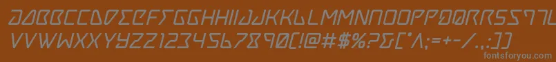 フォントTracerboldital – 茶色の背景に灰色の文字
