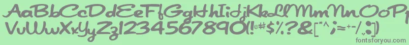 Fonte Japanscript911Regular – fontes cinzas em um fundo verde