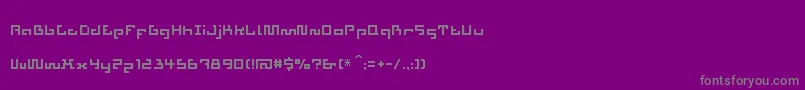 Aztech-fontti – harmaat kirjasimet violetilla taustalla
