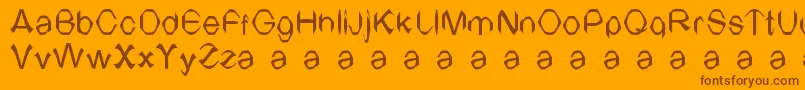 TvArial-Schriftart – Braune Schriften auf orangefarbenem Hintergrund