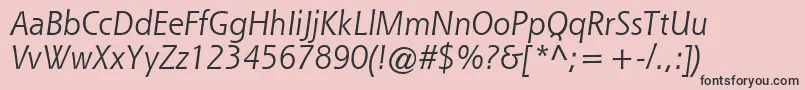フォントQueSsiItalic – ピンクの背景に黒い文字