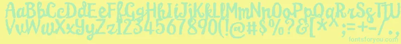 KarameliaDemo Font – Green Fonts on Yellow Background