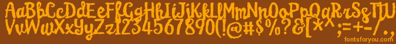 KarameliaDemo Font – Orange Fonts on Brown Background