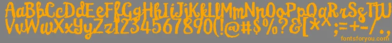 KarameliaDemo Font – Orange Fonts on Gray Background