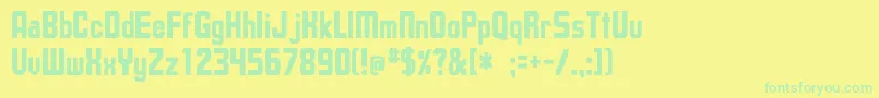 UpsilonCnBold Font – Green Fonts on Yellow Background