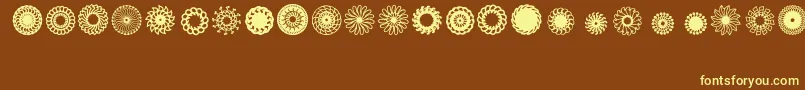 Ladoodles3 Font – Yellow Fonts on Brown Background