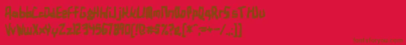 フォントBirdlandaeroplane ffy – 赤い背景に茶色の文字