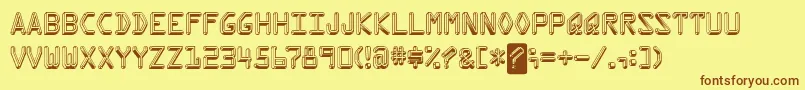 フォントKredit – 茶色の文字が黄色の背景にあります。