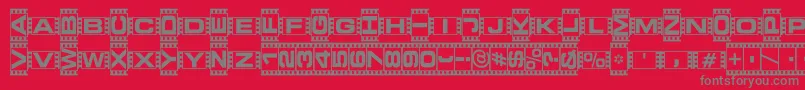 フォントVedeb – 赤い背景に灰色の文字
