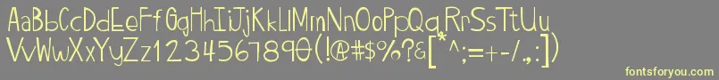 Twiggypop-Schriftart – Gelbe Schriften auf grauem Hintergrund