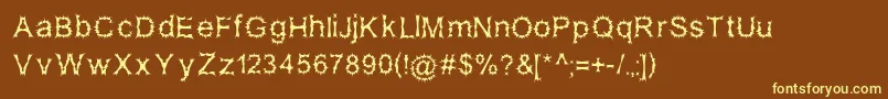 SatanPossessed-fontti – keltaiset fontit ruskealla taustalla