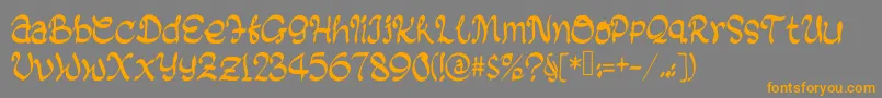 フォントBlackBiscuit – オレンジの文字は灰色の背景にあります。