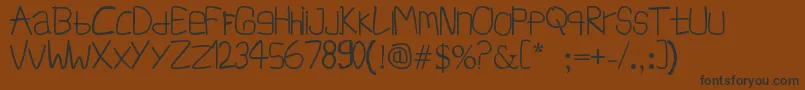 InfSimpangAmpek Font – Black Fonts on Brown Background