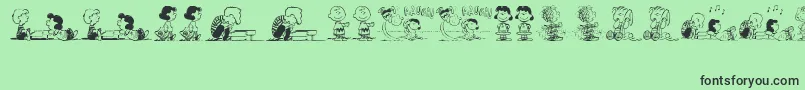 Czcionka PeanutsGangDingbats – czarne czcionki na zielonym tle