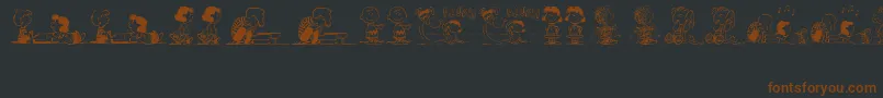 Fonte PeanutsGangDingbats – fontes marrons em um fundo preto