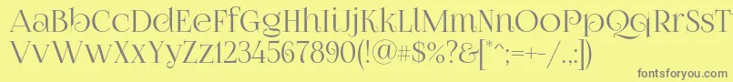 フォントFoglihtenno070841 – 黄色の背景に灰色の文字